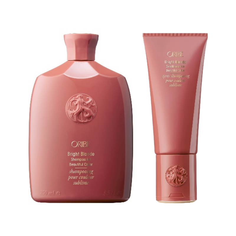 Du nettoyant avec shampoing mauve et après-shampoing Oribe de la Boutique Flair, salon d'extensions capillaires à Blainville.